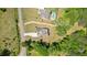 Aerial view of the home featuring a backyard swimming pool surrounded by trees at 3610 Burnt Bridge Rd, Cumming, GA 30028