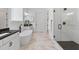 Luxurious bathroom with a standalone tub, walk-in shower, and stylish fixtures for a spa-like experience at 3610 Burnt Bridge Rd, Cumming, GA 30028