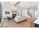 Spacious living room with fireplace, hardwood floors, and an open layout to the dining and kitchen areas at 3610 Burnt Bridge Rd, Cumming, GA 30028