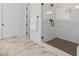 Modern walk-in shower with sleek tile work and contemporary fixtures, providing a refreshing experience at 3610 Burnt Bridge Rd, Cumming, GA 30028