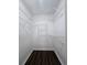 Walk-in closet with metal shelving and laminate flooring for storage at 3647 Diamond Cir, Decatur, GA 30034