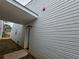 Exterior side view of a house with siding and a covered porch at 3647 Diamond Cir, Decatur, GA 30034