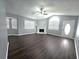 Inviting living room featuring a fireplace, vaulted ceilings and lots of natural light at 3647 Diamond Cir, Decatur, GA 30034