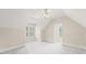 Attic bedroom features neutral walls, gabled ceilings and great natural light at 5293 Aldeburgh Dr, Suwanee, GA 30024