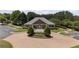 Community clubhouse featuring well manicured grounds with ample parking at 5293 Aldeburgh Dr, Suwanee, GA 30024