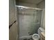 Contemporary bathroom with sliding glass door shower and modern toilet at 1151 Rankin St # 7A, Stone Mountain, GA 30083