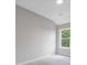 Bedroom with neutral walls, carpet, and a window at 1954 William Glen St, Dacula, GA 30019