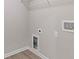 Laundry area with hook ups and shelving at 1954 William Glen St, Dacula, GA 30019