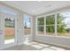 Bright sunroom with large windows offering scenic views and natural light at 1954 William Glen St, Dacula, GA 30019