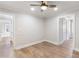 A bedroom boasts hardwood floors, neutral paint, and a ceiling fan at 2260 Old Spring Se Rd, Smyrna, GA 30080