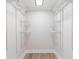 Spacious walk-in closet with ample shelving, providing plenty of storage space for clothes and accessories at 2260 Old Spring Se Rd, Smyrna, GA 30080