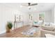Bright and airy living room with modern furnishings and wood floors at 2260 Old Spring Se Rd, Smyrna, GA 30080