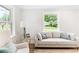 Bright living room filled with natural light and comfortable seating arrangement at 2260 Old Spring Se Rd, Smyrna, GA 30080