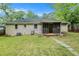 A beautiful home back exterior showing the back porch and nice backyard at 2308 Scotty Cir, Decatur, GA 30032