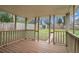 The porch overlooks the spacious yard with a storage shed on the back of the property at 2308 Scotty Cir, Decatur, GA 30032