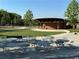 Outdoor amphitheater with a stage, seating and tables, perfect for community events and gatherings at 26 Kensington Rd, Avondale Estates, GA 30002