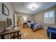 Inviting bedroom with hardwood floors, a comfortable bed, and a functional desk space at 26 Kensington Rd, Avondale Estates, GA 30002
