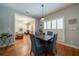 Eat-in dining area with wood table, backyard views, and living room access at 26 Kensington Rd, Avondale Estates, GA 30002