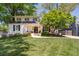 Charming two-story home with a well-manicured front yard and inviting curb appeal at 26 Kensington Rd, Avondale Estates, GA 30002