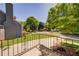 Charming home's front yard with manicured lawn and mature trees, enhancing curb appeal at 26 Kensington Rd, Avondale Estates, GA 30002
