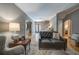 Comfortable living room featuring hardwood floors, soft gray walls, and stylish furnishings at 26 Kensington Rd, Avondale Estates, GA 30002