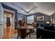 Stylish living room with dark blue walls, hardwood floors, and a cozy sitting area at 26 Kensington Rd, Avondale Estates, GA 30002