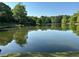 A scenic view of the lake offering a serene atmosphere and natural beauty for relaxation at 26 Kensington Rd, Avondale Estates, GA 30002