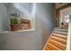 Welcoming stairway with hardwood steps and decorative accents, leading to the upper level at 26 Kensington Rd, Avondale Estates, GA 30002