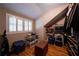 This walk-in closet features natural light, hardwood floors, and shelving that create a serene storage space at 26 Kensington Rd, Avondale Estates, GA 30002