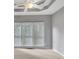 Bedroom with neutral paint, carpet and a modern ceiling fan with ample light at 2825 Harbor Cove Ct, Cumming, GA 30041