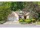 Inviting single-Gathering house with two-car garage and lush front yard at 2825 Harbor Cove Ct, Cumming, GA 30041