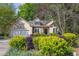 Beautiful home with a two-car garage, stone accents, and an attractive yard at 2825 Harbor Cove Ct, Cumming, GA 30041