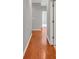 Hallway features gorgeous hardwood flooring leading to other rooms in the home at 2825 Harbor Cove Ct, Cumming, GA 30041