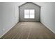 Neutral bedroom with tan carpet, light-grey walls and natural lighting at 4449 Sierra Creek Dr, Hoschton, GA 30548