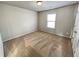 Clean bedroom with soft carpet, and a comfortable bed at 4449 Sierra Creek Dr, Hoschton, GA 30548