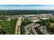 Aerial view of neighborhood and home at 11760 Stratham Dr, near Alpha Loop and Avalon at 11760 Stratham Dr, Alpharetta, GA 30009