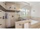 Luxurious bathroom featuring a glass-enclosed shower and a soaking tub at 629 Boulevard Ne, Atlanta, GA 30308