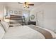Cozy bedroom featuring a queen bed, bunk beds, and a decorative Eiffel Tower statue on the dresser at 629 Boulevard Ne, Atlanta, GA 30308