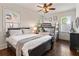 Spacious bedroom with a queen bed, bunk bed, hardwood floors, and abundant natural light at 629 Boulevard Ne, Atlanta, GA 30308