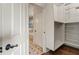 Walk-in closet with custom shelving conveniently located near a bathroom at 629 Boulevard Ne, Atlanta, GA 30308