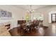 Formal dining room with hardwood floors, fireplace, and archway to the office space at 629 Boulevard Ne, Atlanta, GA 30308