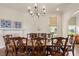 Dining room featuring hardwood floors, fireplace and large table, with a view to the backyard at 629 Boulevard Ne, Atlanta, GA 30308