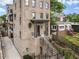 Charming exterior view of a brick multi-story home with lush landscaping and inviting entryway at 629 Boulevard Ne, Atlanta, GA 30308