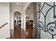 Grand foyer featuring hardwood floors and arched doorways leading to dining and living spaces at 629 Boulevard Ne, Atlanta, GA 30308