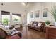 Bright living room with hardwood floors, high ceilings, and sliding glass doors to balcony at 629 Boulevard Ne, Atlanta, GA 30308