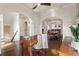 Bright office with hardwood floors, paneled walls, coffered ceilings, and an archway to the dining room at 629 Boulevard Ne, Atlanta, GA 30308