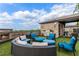 Enjoy a lovely rooftop deck featuring a fireplace, outdoor kitchen, and ample seating with a beautiful sky view at 629 Boulevard Ne, Atlanta, GA 30308