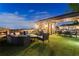 Relax on this rooftop deck featuring an outdoor fireplace, seating, and dining areas, all with beautiful views at 629 Boulevard Ne, Atlanta, GA 30308