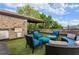 Relax in style on this rooftop terrace with an outdoor kitchen, dining area, and comfortable lounge seating at 629 Boulevard Ne, Atlanta, GA 30308