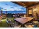 Enjoy stunning city views from this rooftop terrace with a dining area, fireplace, and cozy seating under the evening sky at 629 Boulevard Ne, Atlanta, GA 30308